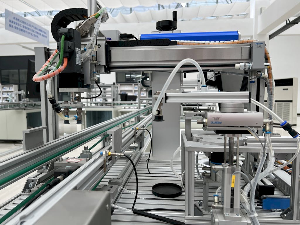 This image shows a close-up view of modern automated production equipment operating within Atrium Scientific Group’s FDA-registered, cGMP-compliant manufacturing facility. Advanced automation systems support batch consistency, controlled processing parameters, and scalable production across dietary supplements, oral thin films, topical formulations, and specialty dosage formats. Integrated automation enhances manufacturing efficiency while maintaining strict quality and regulatory oversight.