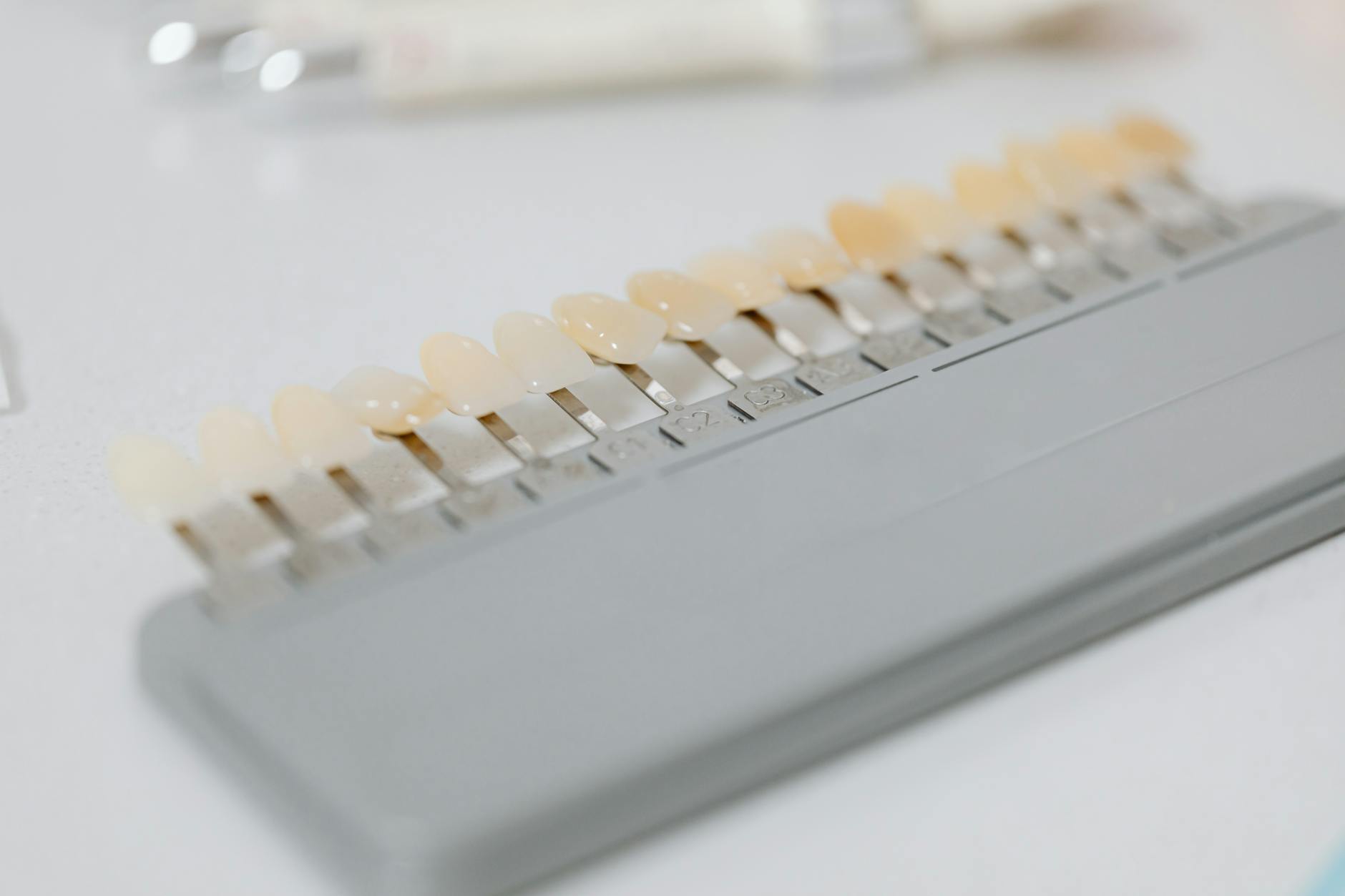 Close-up image of a dental shade guide displaying various tooth color options. — Atrium Scientific Group