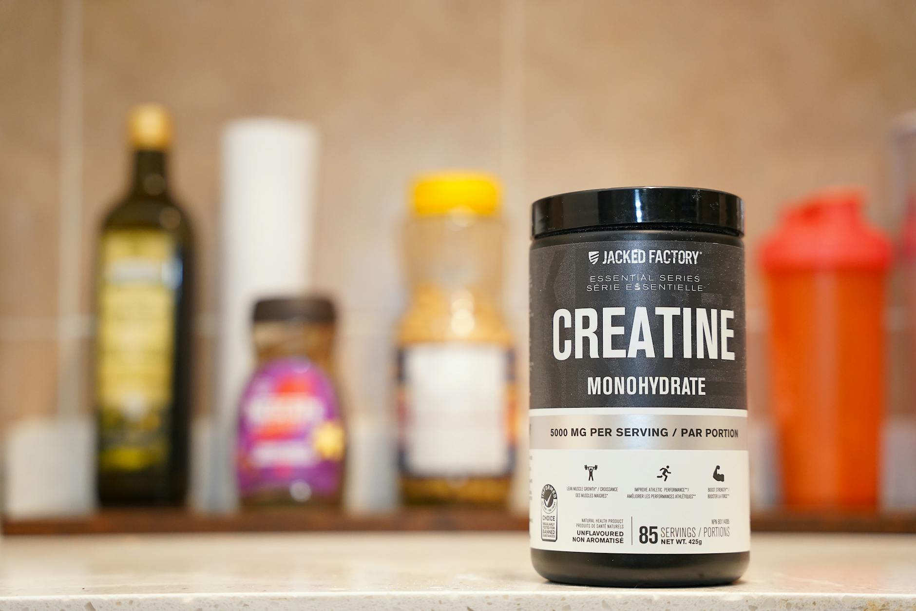 Creatine monohydrate from Jacked Factory displayed on a kitchen counter. — Atrium Scientific Group